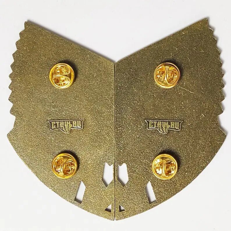 Doctor Strange badge brooch back view showing both hinged halves and pin clasps