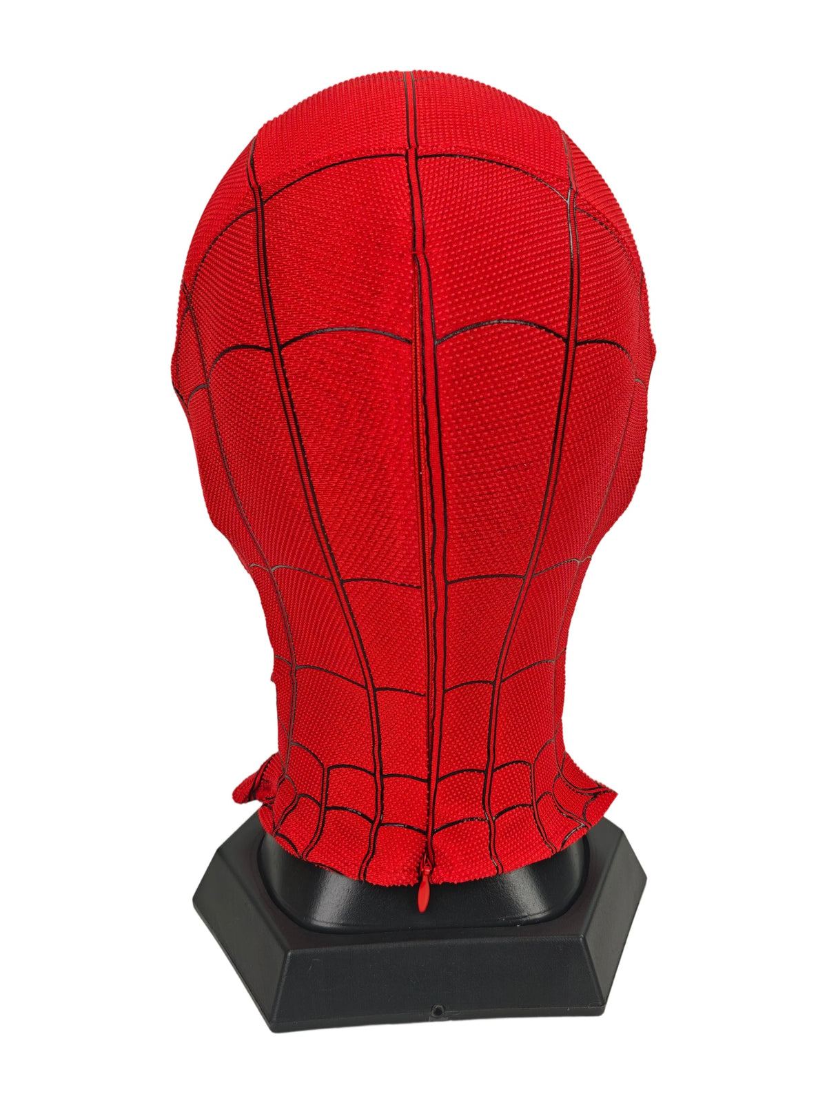 Spider-Man Homecoming mask rear three-quarter view with red segmented fabric, black panel seams, and black stand