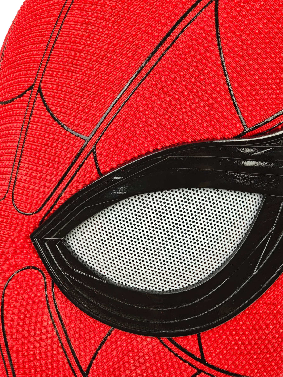Close-up of Spider-Man Homecoming mask lens with white mesh, black layered frame, red raised dots, and black seams