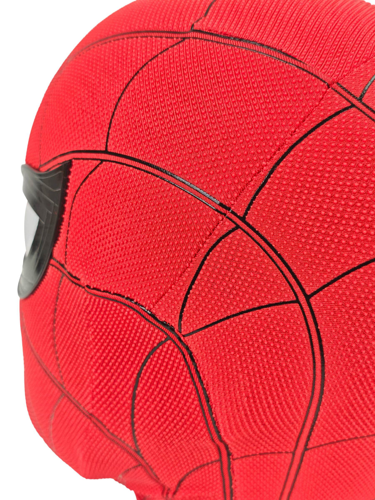Close-up of Spider-Man Homecoming mask fabric with red raised dots, black panel seams, and black lens edge