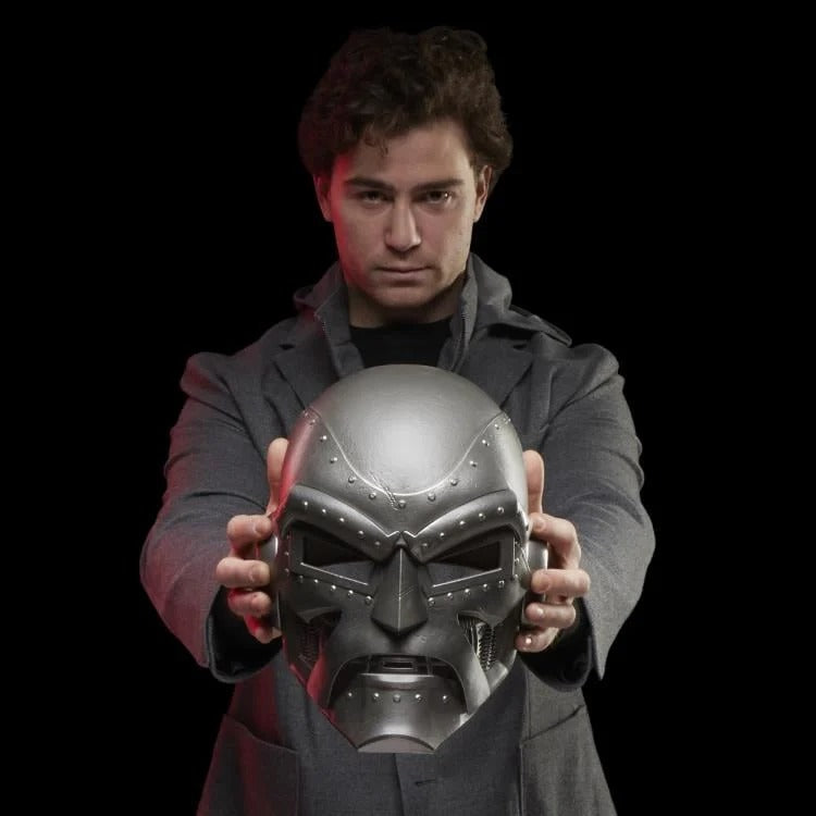 Person holding Doctor Doom helmet, front view