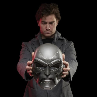 Person holding Doctor Doom helmet, front view
