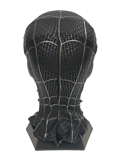 Miles Morales black Spider-Man mask back view with center seam, raised webbing, textured fabric, and black stand