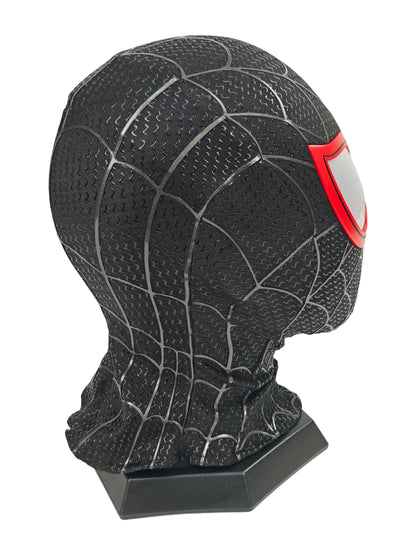 Miles Morales black Spider-Man mask rear three-quarter view with web panels, red lens edge, and black stand