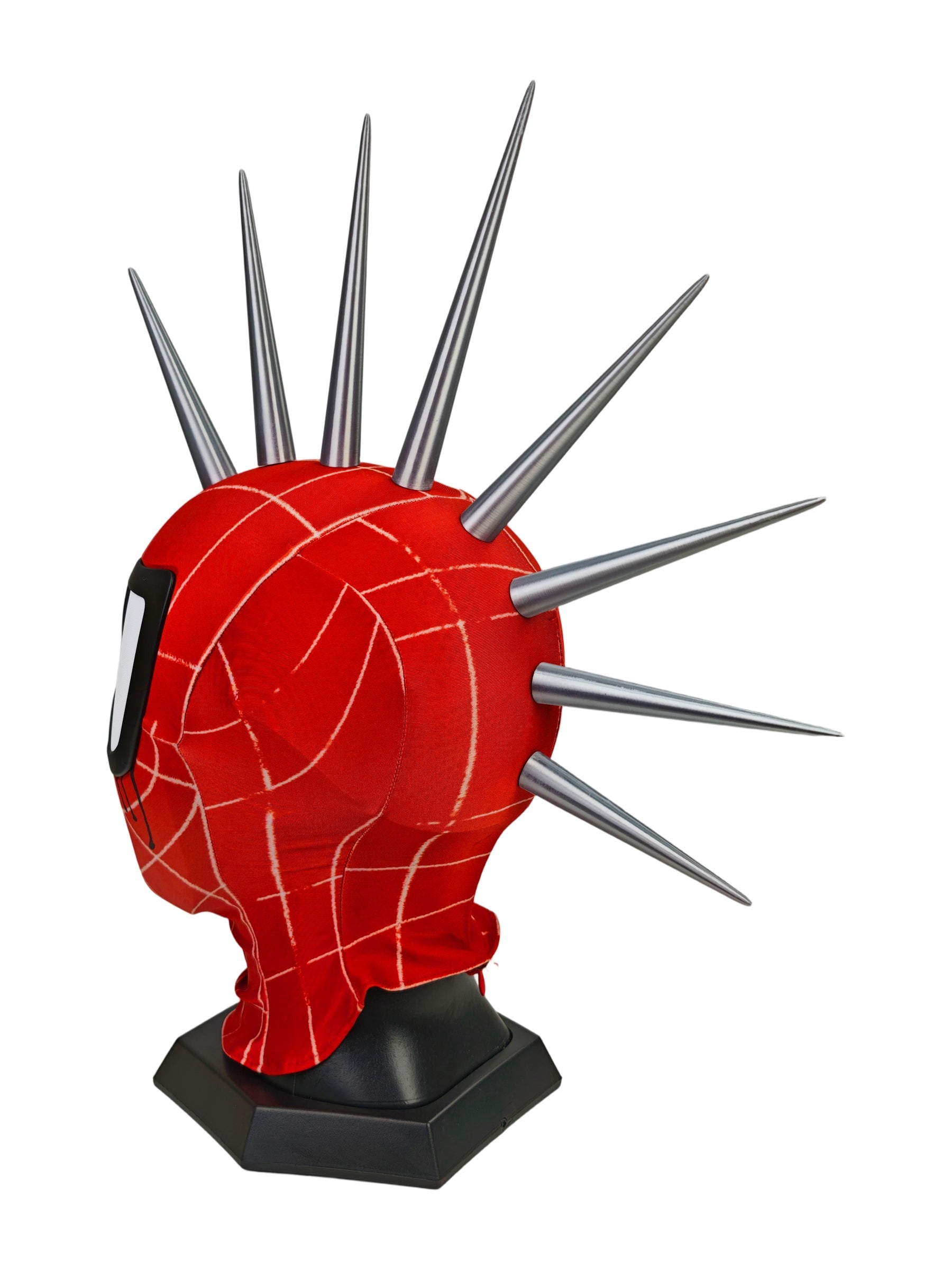 Punk Spider mask with sharp metallic spikes on top, displayed on a black stand against a plain white background.