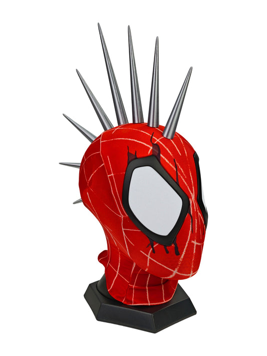 A red and black Punk Spider mask displayed on a black stand, with tall metallic spikes rising from the top, photographed against a plain white background.