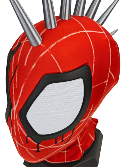 Punk Spider mask hood with white web-line graphics and multiple metallic spikes on top, displayed on a black stand against a plain white background.