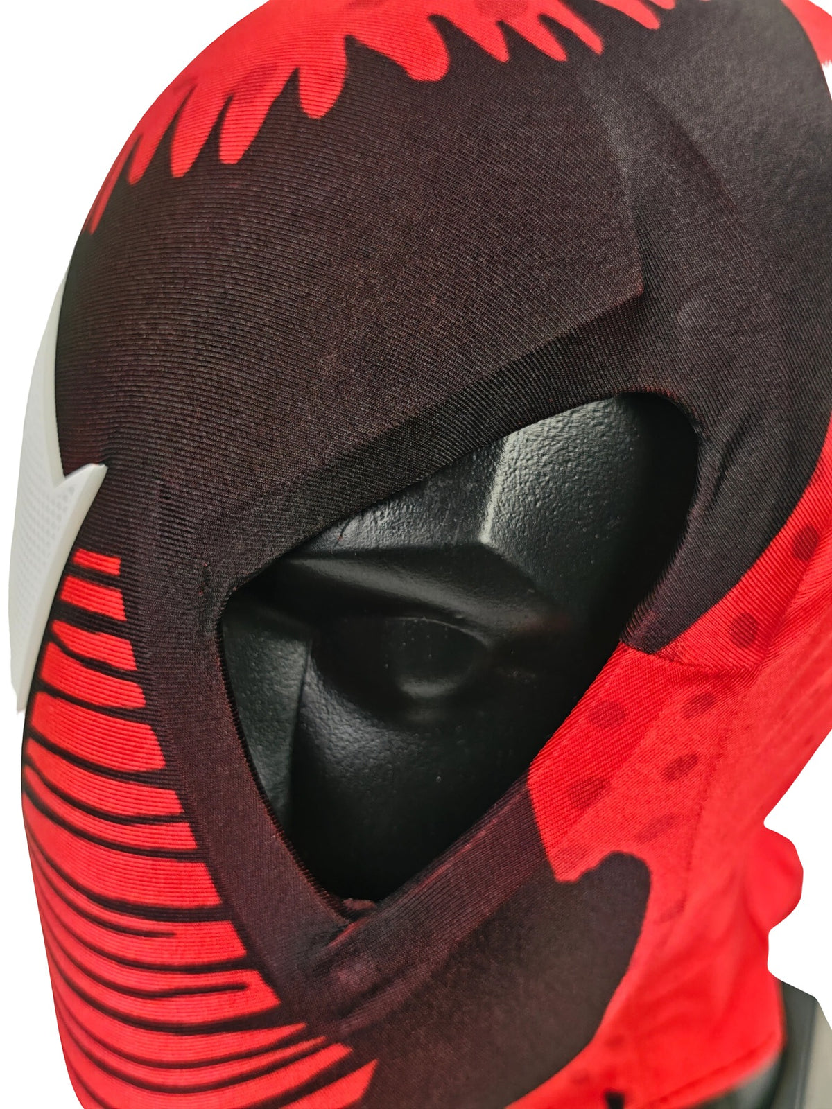 Close-up of Scarlet Spider-Man mask eye opening showing the black faceshell beneath the fabric