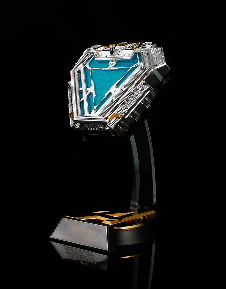 Iron Man MK50 arc reactor replica on illuminated Avengers stand, angled front view