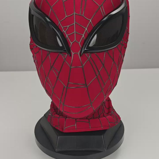 Superior Spider-Man mask product video showing a red webbed mask with black eye lenses on a display base
