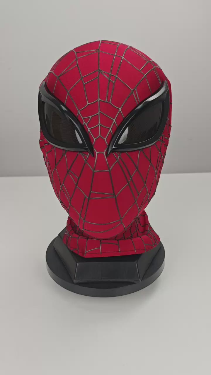 Superior Spider-Man mask product video showing a red webbed mask with black eye lenses on a display base
